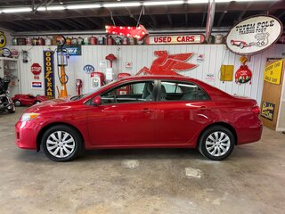 2012 Toyota Corolla 4dr Sdn Man L (Natl) — photo 2